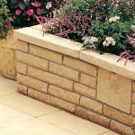 BRADSTONE TEXTURED COPING BUFF 580X136X50MM